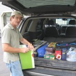 Dave loading gear into the Explorer